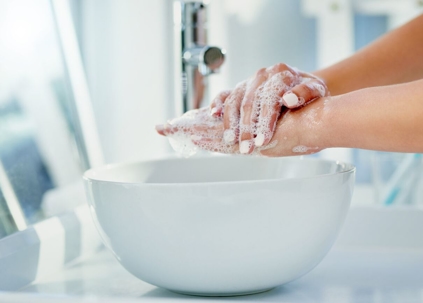 Person washing their hands