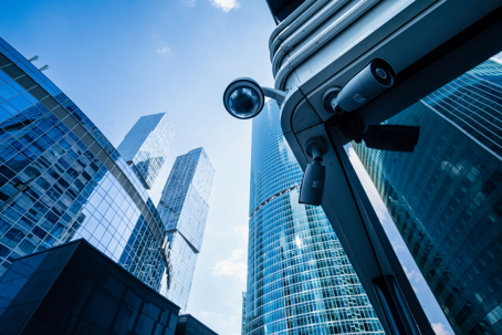 security camera on a business building corner